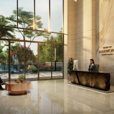 Arrival lobby of CKPC Heart of Harmony with its reception desk, developer render